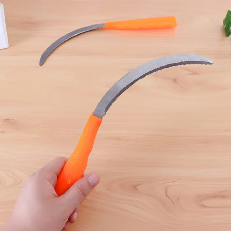 منجل يدوي مسنّن بمقبض برتقالي على طاولة خشبية | Serrated hand sickle with an orange handle on a wooden table